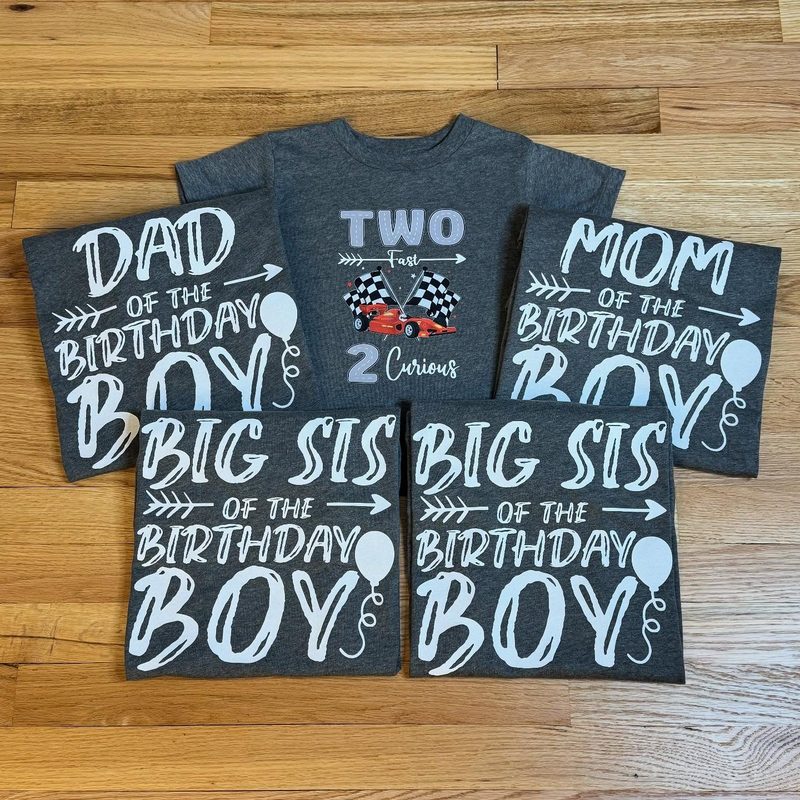 Matching gray “Mom,” “Dad,” and “Big Sis of the Birthday Boy” shirts around a race-car “Two Fast” birthday tee